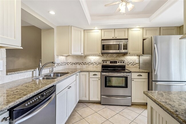 Building Photo - 7430 Lake Breeze Dr Unit 206
