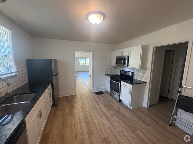 Building Photo - Updated Three Bedroom Home on the NE side ...