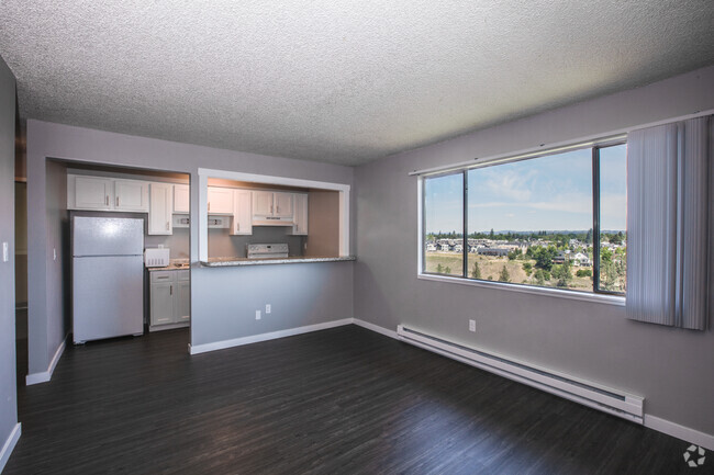 Broadmoor Apartments living room and kitchen - Broadmoor Rental