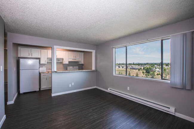 Broadmoor Apartments living room and kitchen - Broadmoor Apartments