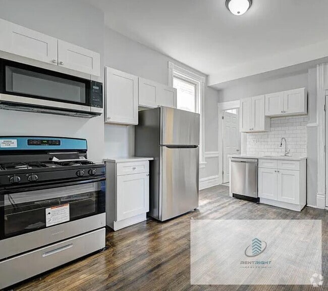 Building Photo - 2926 S Wallace St Unit 3R Rental