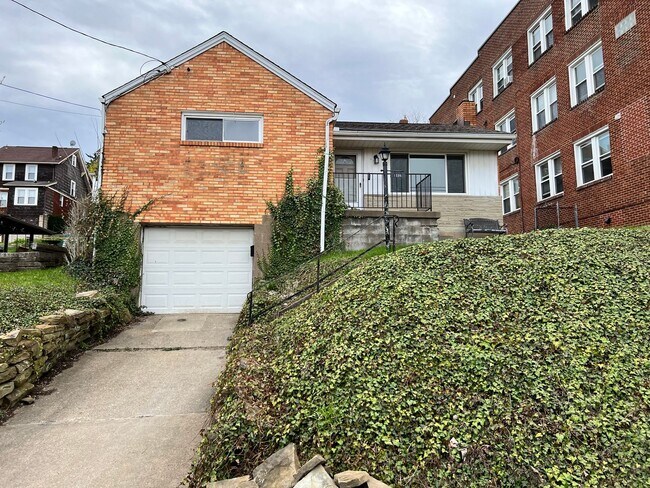 Building Photo - Fantastically updated three bedroom two bath house in the heart of Dormont