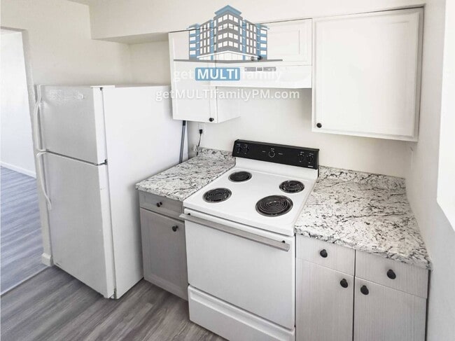 Building Photo - 7120 N 66th Dr Unit 101