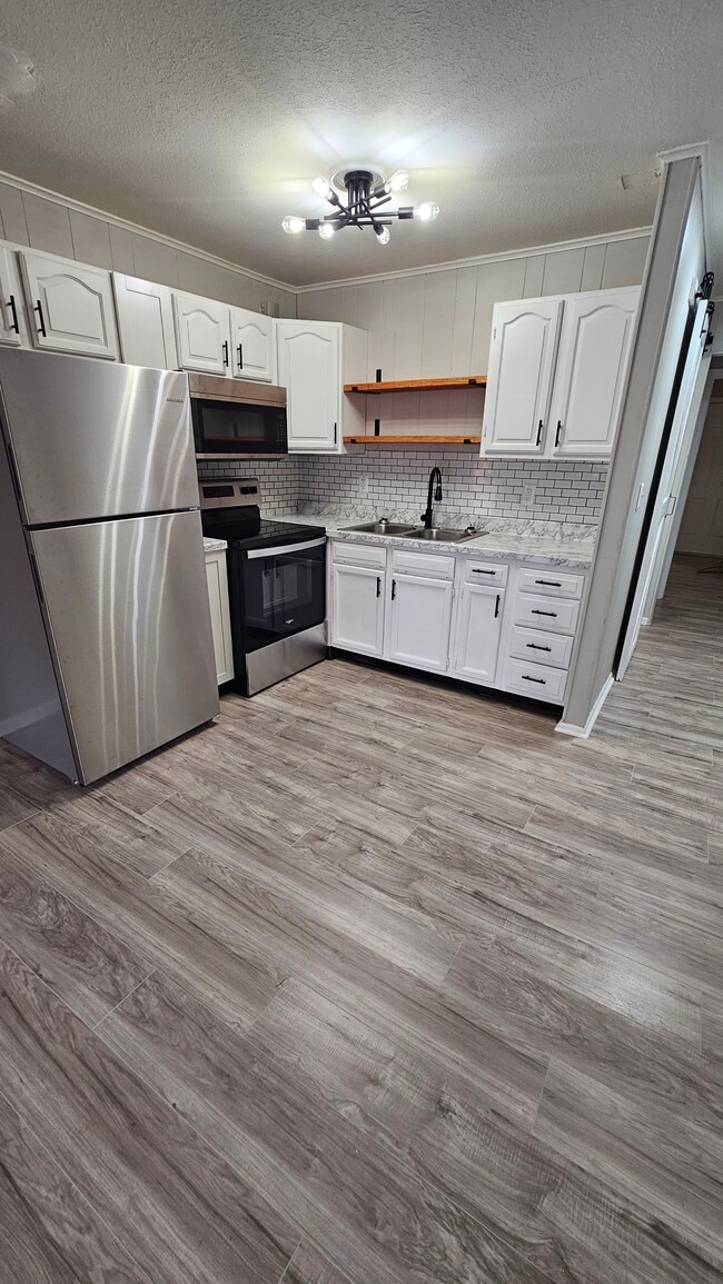 Photo - Southern Charm & Modern Luxury Await: Disc...