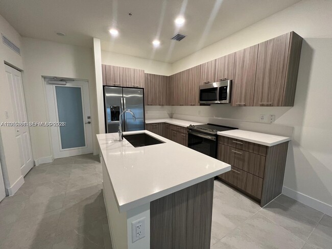 Building Photo - 8363 NW 41st St Unit A-104