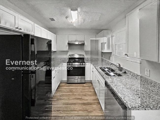 Photo - 3 Bed, 3 Bath Home with Fenced Yard & Garage / Pet-Friendly / Available Now!