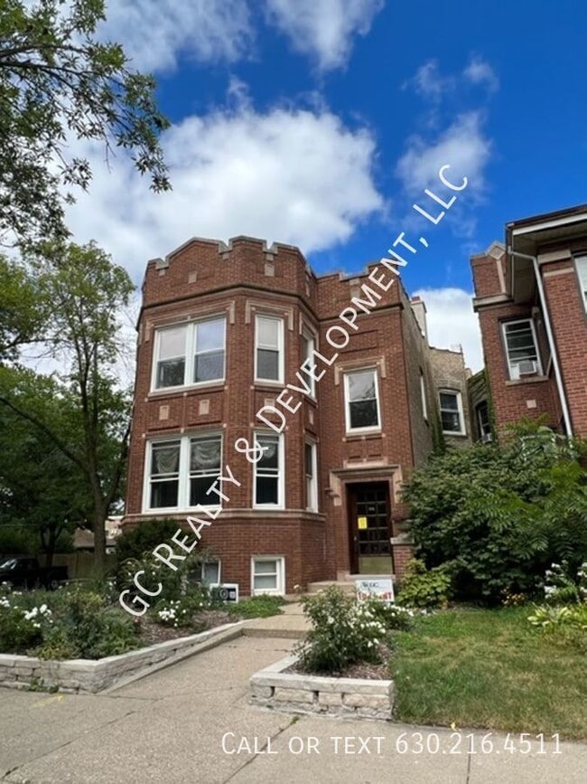 Building Photo - 2144 W Estes Ave Unit 2
