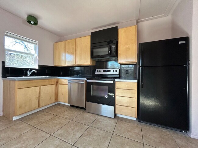 Photo - Indulge in the charm and comfort of a cozy, inviting home! Unit Front