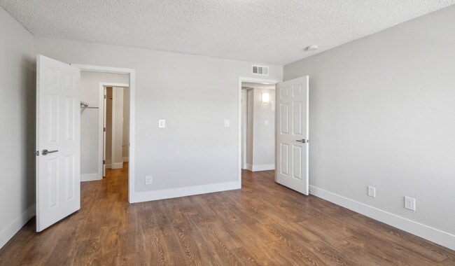 Master bedroom with bathroom accessed through walk-in closet - Meadow Creek