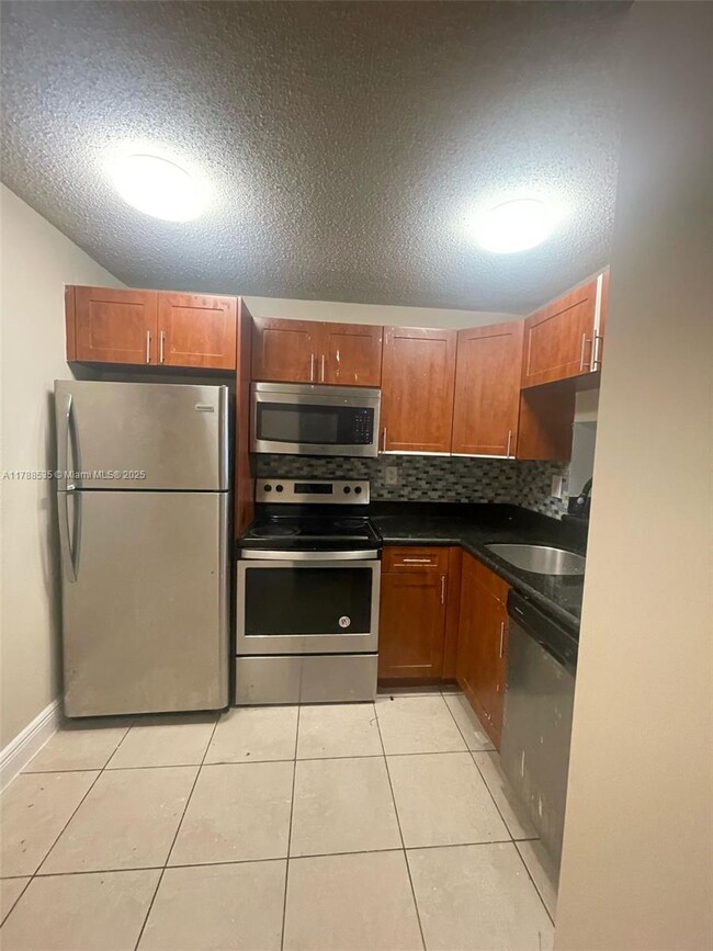 Photo - 486 NW 165th St Condo Unit B-108