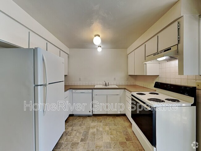 Building Photo - 823 E 9th Ave Rental
