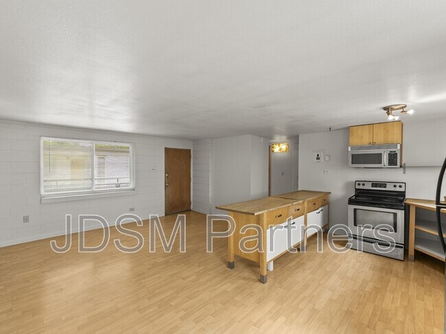 Building Photo - 2860 W 32nd Ave Unit #105