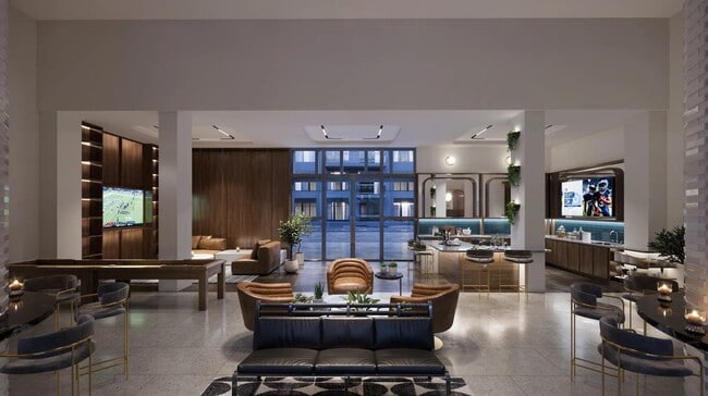 Expansive clubroom with gathering space, demonstration kitchen, and shuffleboard.