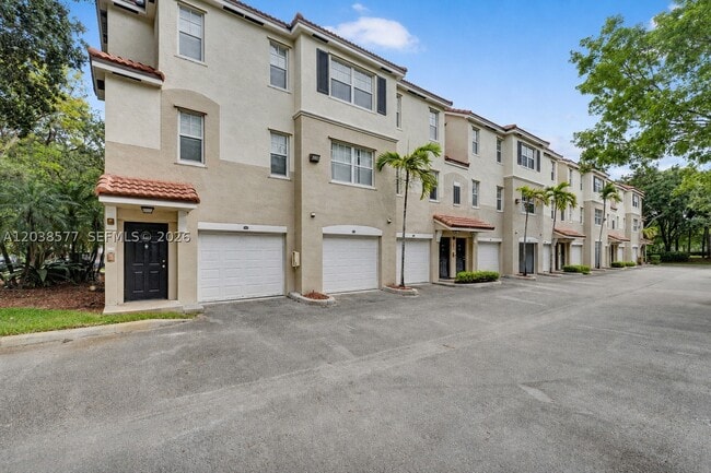 Building Photo - 5880 W Sample Rd Unit 203