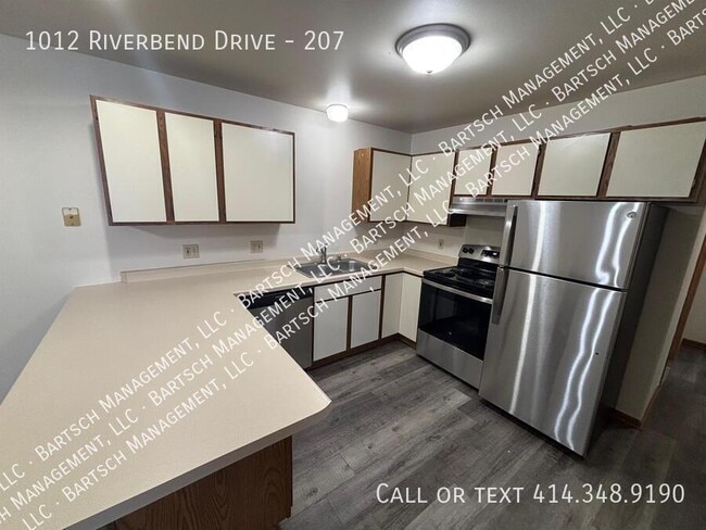 Building Photo - 1012 Riverbend Dr Unit 207
