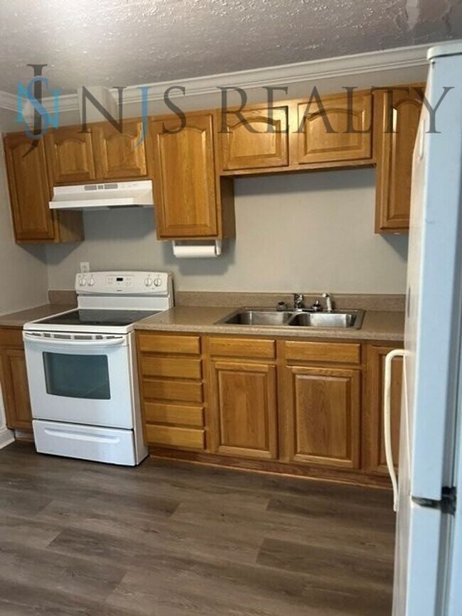 Photo - JUST RENOVATED! 2/1, 1180sq ft, Fully Updated Kitchen~Bath ~floors. NEW Appliances & Paint... wit...
