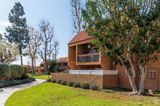 6600 Warner Ave - Villa Warner Condominiums