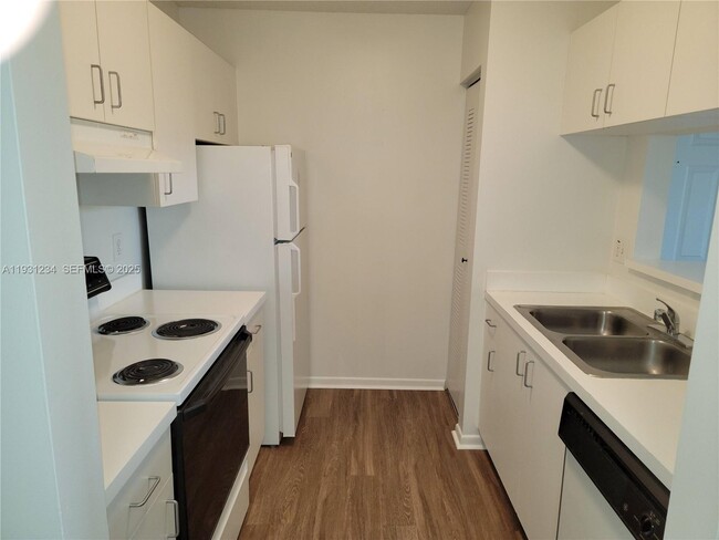 Photo - 1701 Village Blvd Unit 205