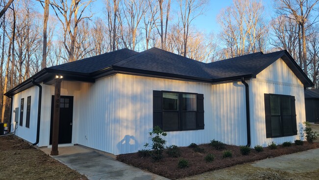 Left side of duplex 1 bedroom covered porch entrance - 1908 Charles Raper Jonas Hwy Apartments