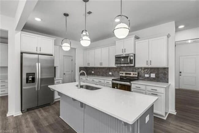 Photo - Spacious 3-Bedroom Townhome with Private Patio, Central HVAC & In-Unit Laundry Hookups