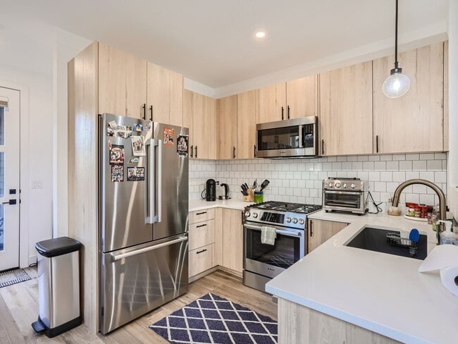 Photo - Evolve Real Estate: Gorgeous Rowhome with ROOFTOP DECK blocks from DU Available July 5!