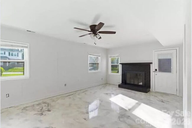 Photo - "Discover Comfort and Space in Charlotte: 4-Bed, 3-Bath Gem on Red Carriage Lane!"