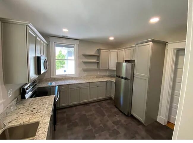 Kitchen / lots of storage ! - 2885 Erie Ave Unit Apartment #2