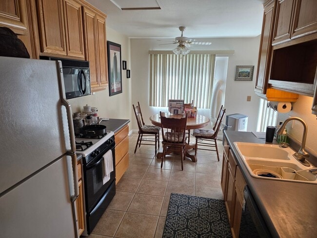 Photo - Large 4 bedroom 2 bath home with downstairs bedroom and attached garage