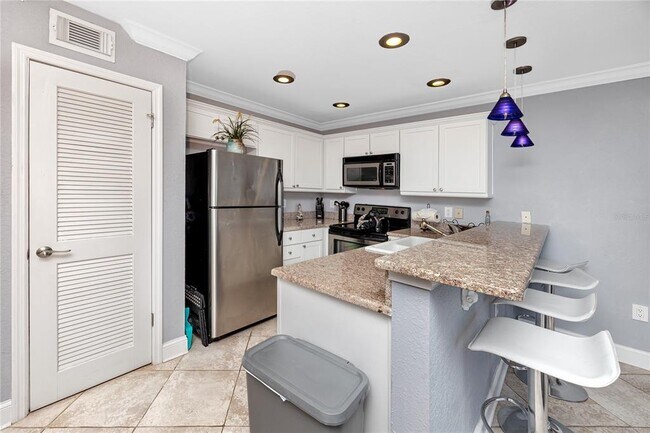 Photo - 4103 Gulf Blvd Unit 209