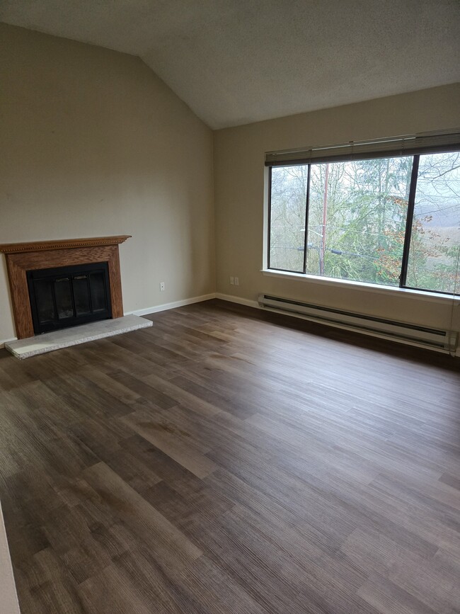 Family room with fireplace - 3740 Lake Washington Blvd SE Apartment Unit 2B