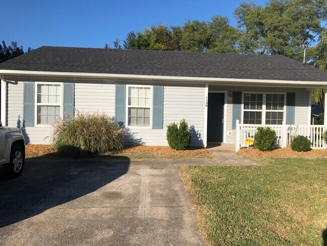 Front of house with easy access with one step into the house.