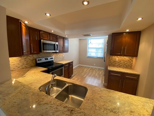 Building Photo - 7365 NW 18th St Unit 202