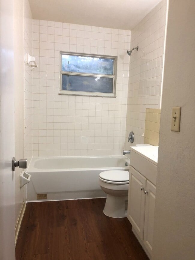 Photo - SPACIOUS 3BR/1.5BA w/Carport, Beautiful Wood Finish Flooring, Privacy Fenced Backyard! NO APP FEE!