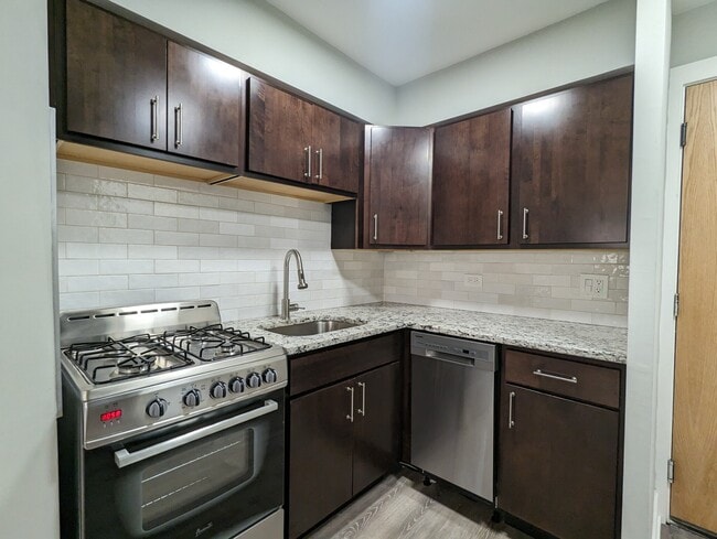 Building Photo - 454 W Barry Ave