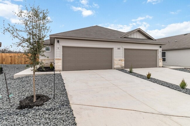 Building Photo - New Construction Townhome with High Ceilings & 2-Car Garage