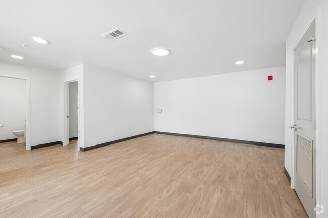 3BR, 2BA - 1,046SF - Living Room - The Mabion
