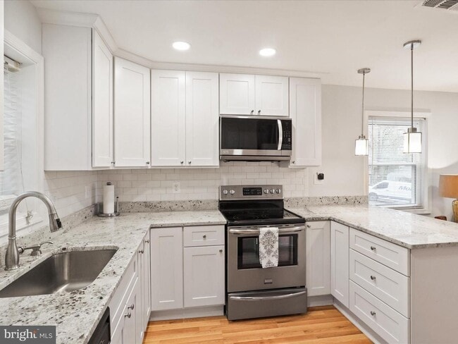 Photo - This home blends urban accessibility with peaceful natural surroundings.