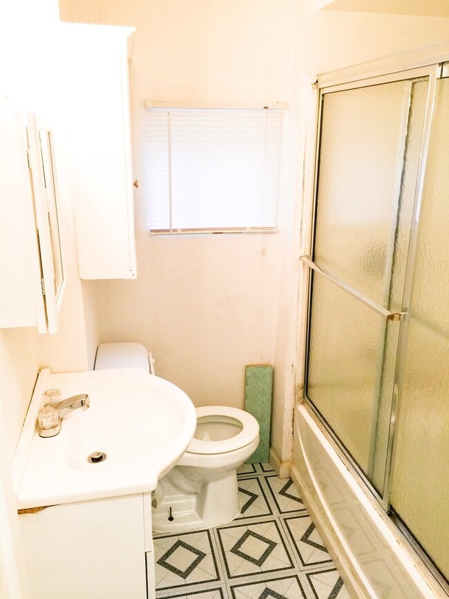 Photo - 2BR/1BA Single Family House with basement work-space and big yard!