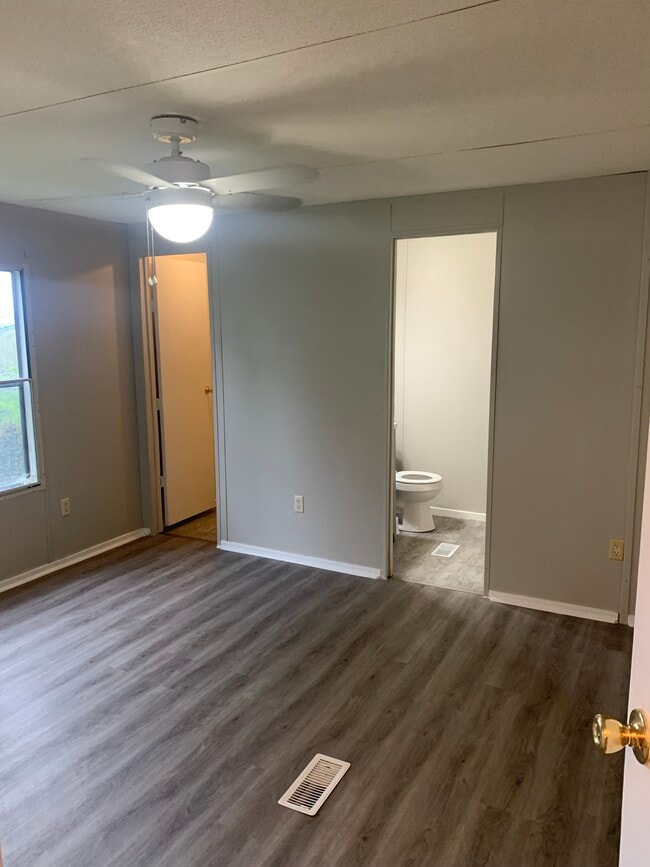 Primary bedroom with full bathroom