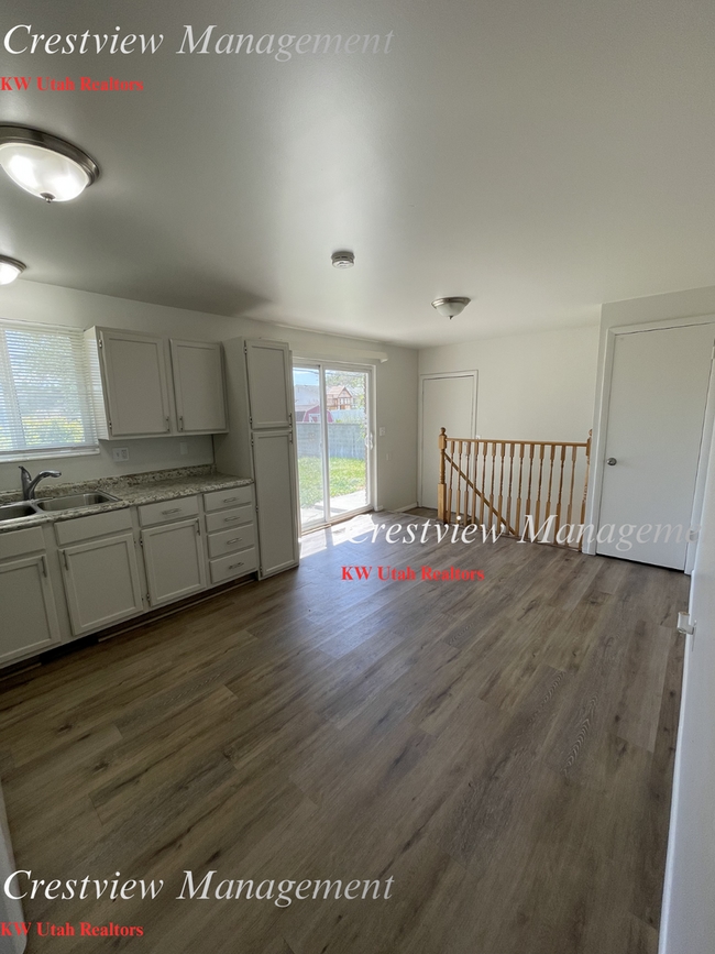 Photo - Charming 4-Bedroom Home in West Valley City – Spacious & Convenient Location- 1st month's rent Free!
