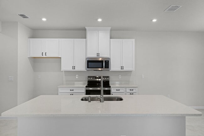 Photo - Brand-New 4BR Home with Tile Floors & Quar...