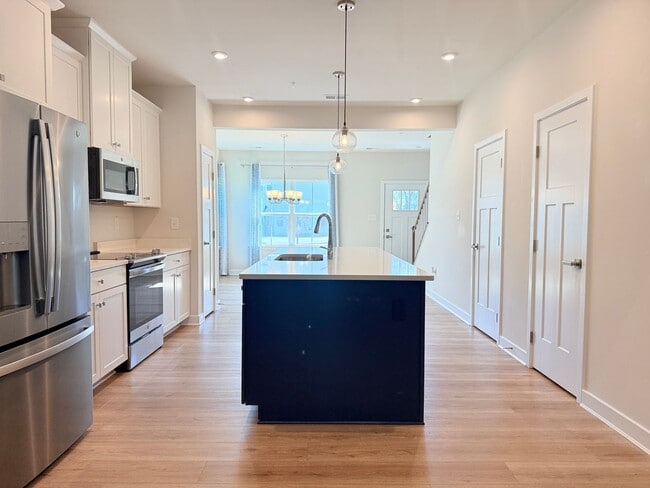 Photo - Coastal Luxury Living in River Run – Minut...