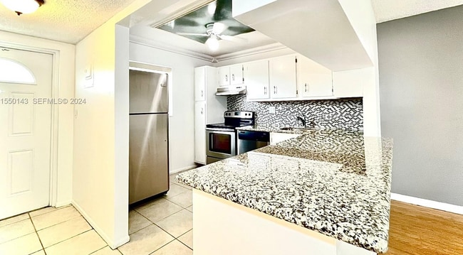 Building Photo - 8330 Sands Point Blvd Unit N307