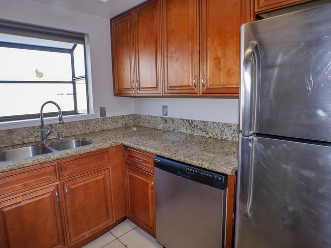 Photo - Charming 2 bed/2 bath second level condo with washer/dryer & assigned parking Unit 5