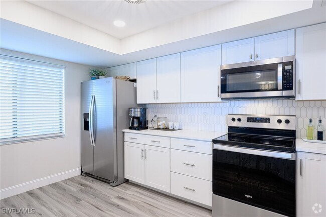 Building Photo - 586 Beachwalk Cir Unit O-205 Rental