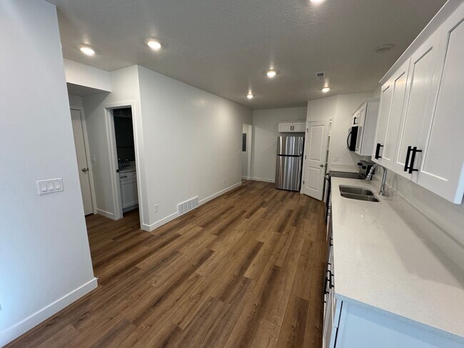 Photo - Recently Finished Basement! 3 bed 2 bath - in unit laundry!
