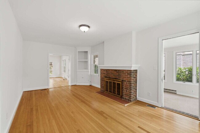 Photo - Elegant Center-Hall Cape Cod with Sunroom, Garage & Timeless Charm