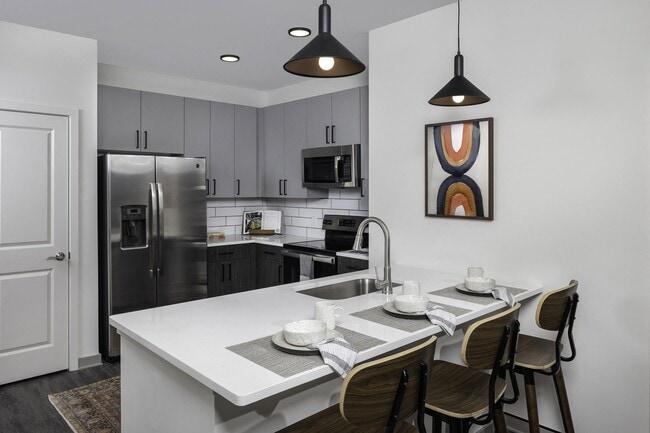 Our chef-inspired kitchens feature designer finishes and stainless steel appliances.