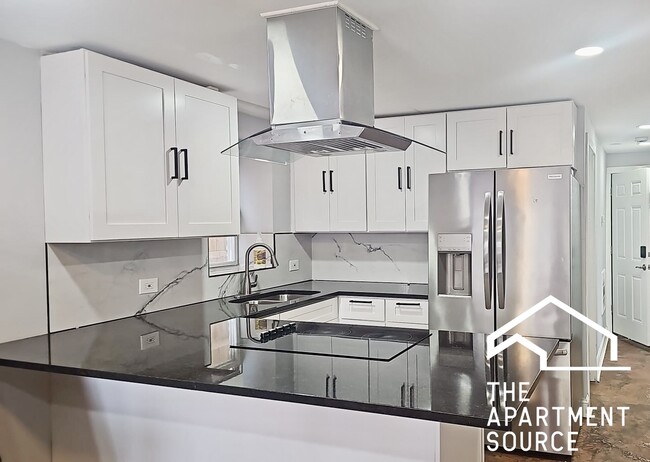 Building Photo - 3858 W Grenshaw St Unit 3858 Grenshaw