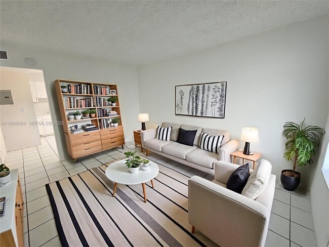 Building Photo - 6961 W 14th Ct Unit 204